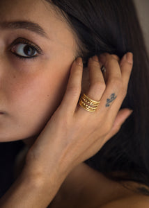  Zola Ring – a gold plated beauty with a fusion of bohemian and contemporary style. With its layered chunky design it's set to make a statement. And the adjustable size ensures a comfortable fit for any finger. Definitely a fun piece to add to your ring collection